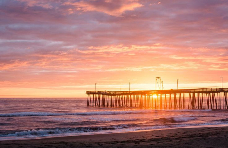 Beach sunset at Coastal Accommodations.