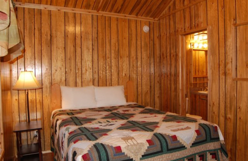 Cabin bedroom at Yogi Bear's Jellystone Park Warrens.