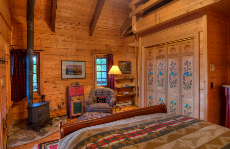 Cabin bedroom at The Home Ranch.