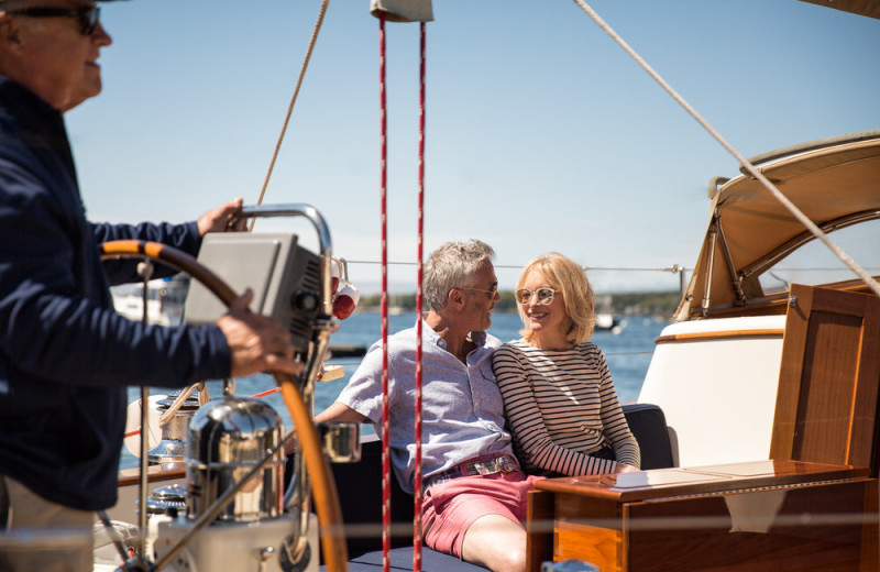 Couple on boat at Boothbay Harbor Oceanside Golf Resort.