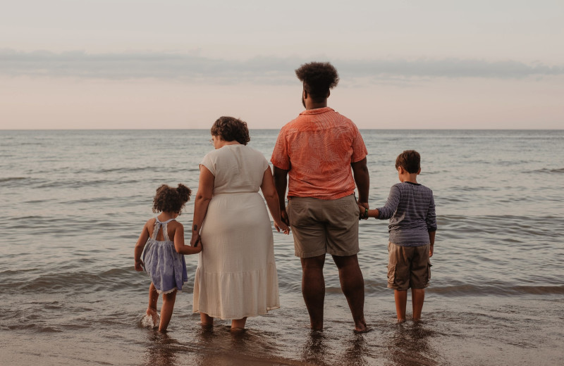 Family on beach at Clarion Resort Fontainebleau Hotel.