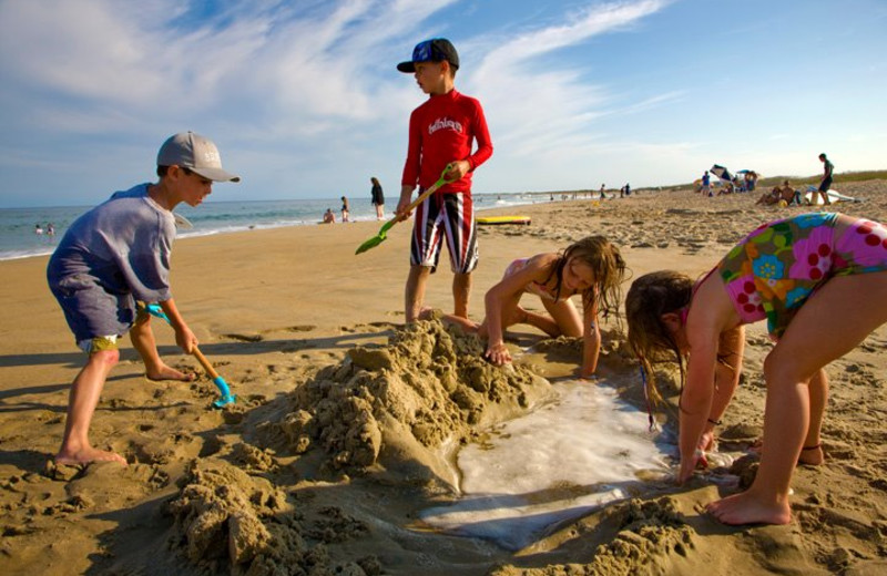 Kids Building Sandcastle at Hatteras Realty 