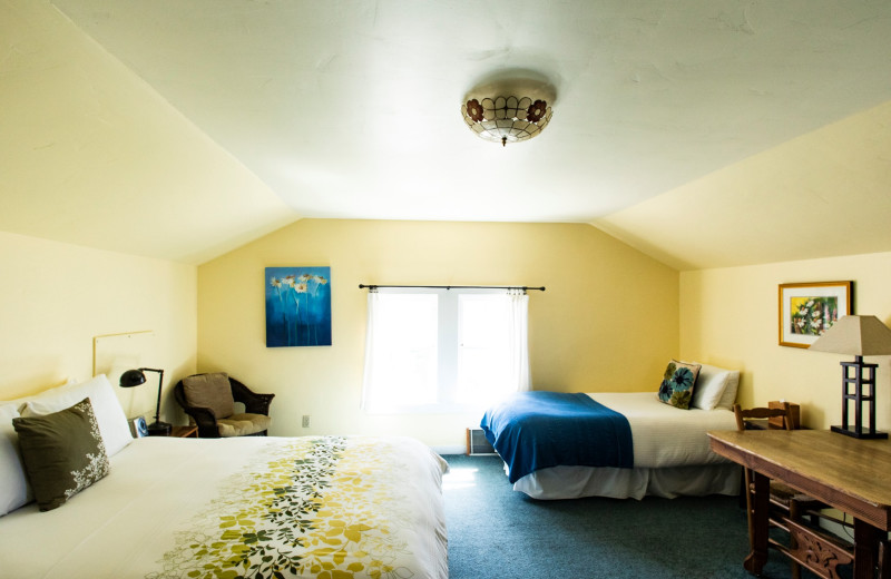 Cottage bedroom at Alegria Oceanfront Inn & Cottages.