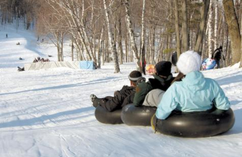Snow tubing at Waterbury Inn Condominium Resort.