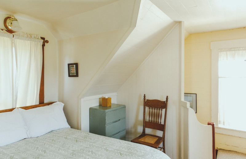 Farm house bedroom at Alegria Oceanfront Inn & Cottages.