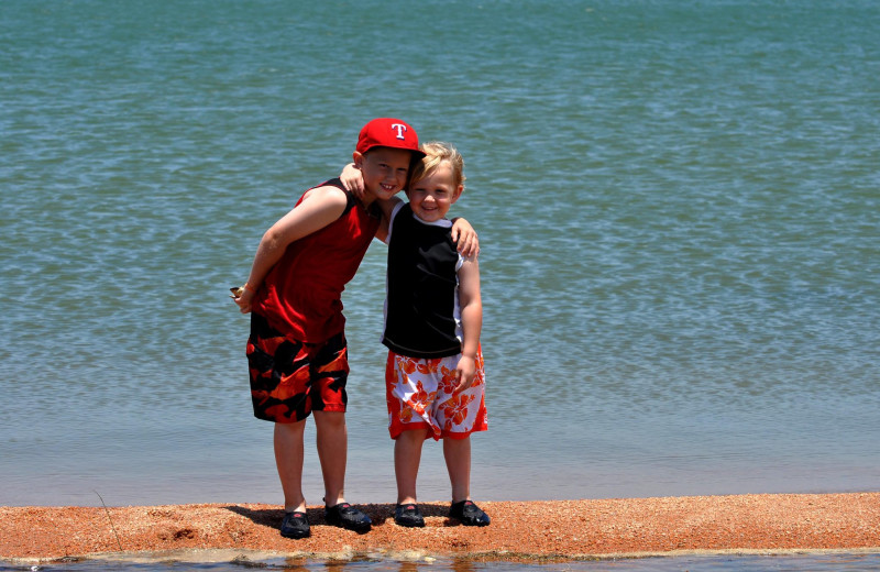 Children on beach at Willow Point Resort.