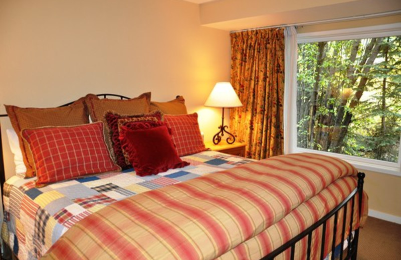 Vacation rental bedroom at SilverStar Luxury Properties.