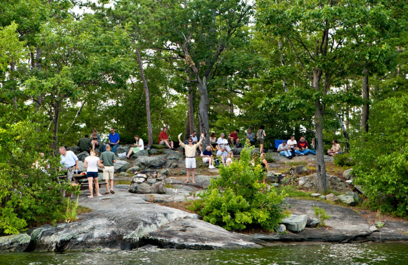 Relaxing by the lake at Rockywold-Deephaven Camps.