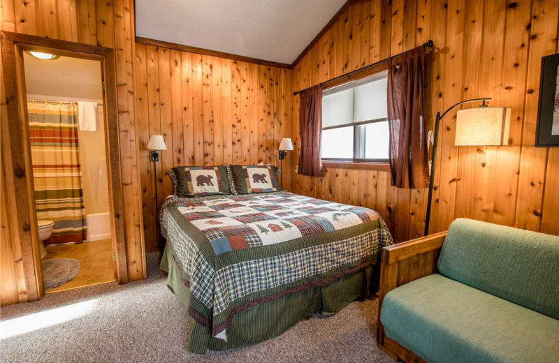 Cabin bedroom at Big Powderhorn Lodging Association.