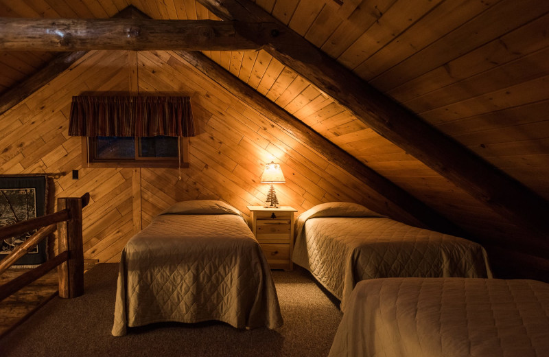 Cabin bedroom at Pitlik's Sand Beach Resort.