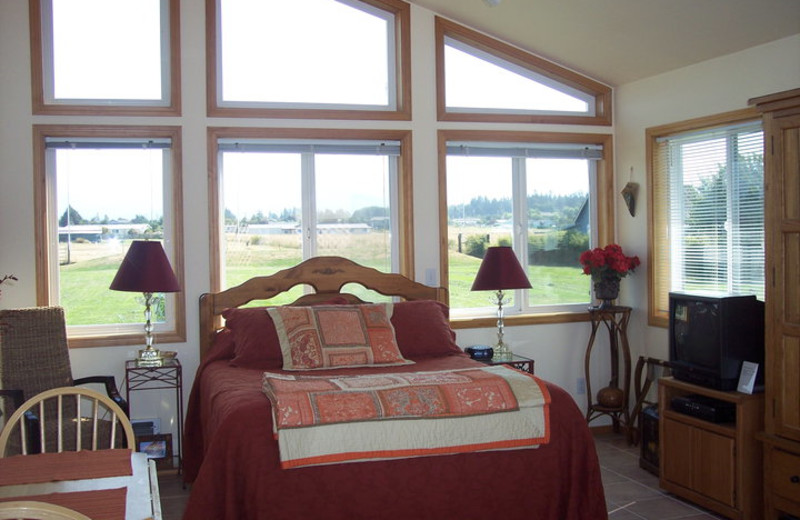 Cottage bedroom at Juan De Fuca Cottages.