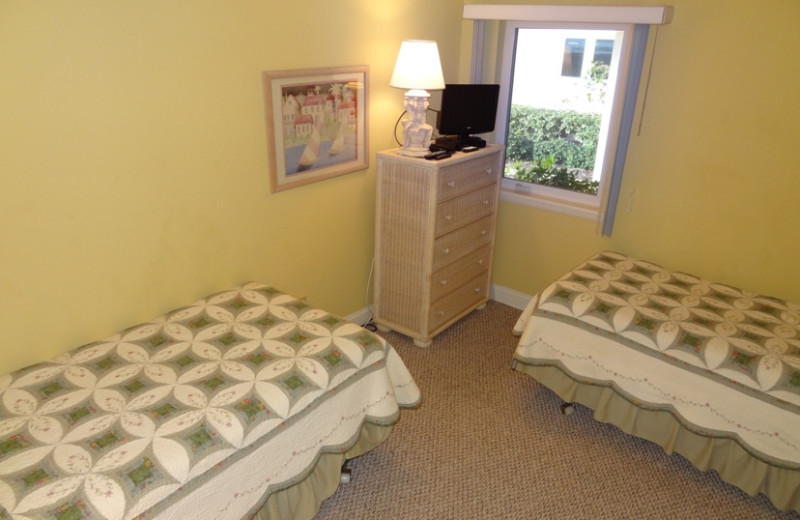 Rental bedroom at Sand Cay Beach Resort.