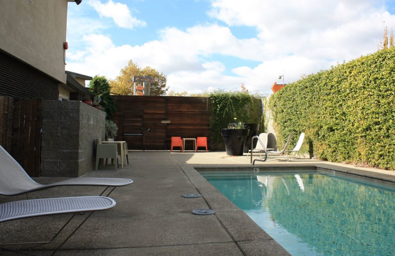 Outdoor pool at The Greens Hotel.