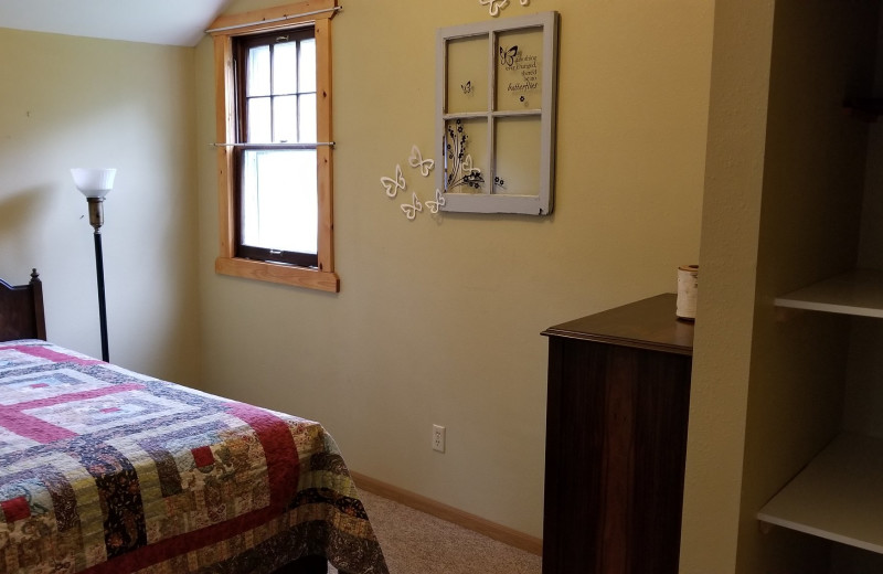 Cabin bedroom at Riverside Resort.