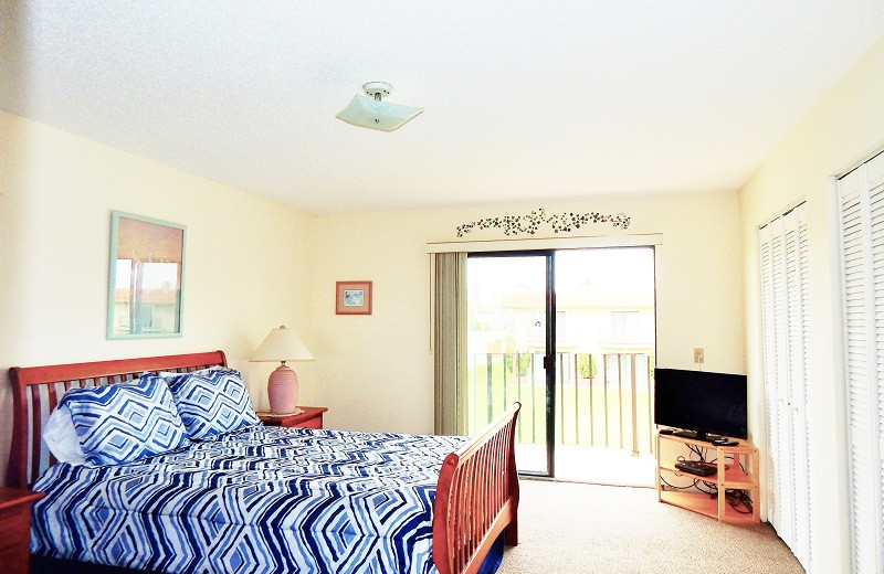 Rental bedroom at Family Sun Vacation Rentals.