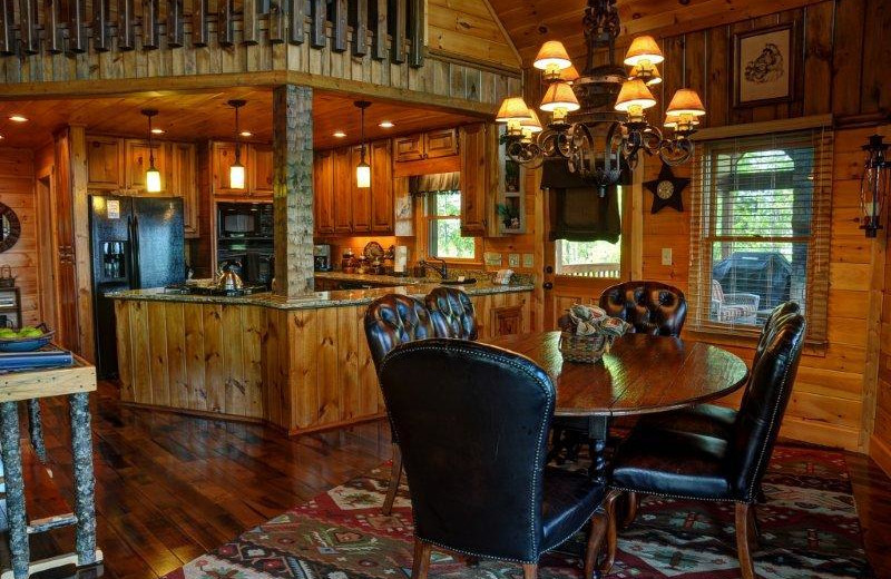 Cabin dining room at Southern Comfort Cabin Rentals.