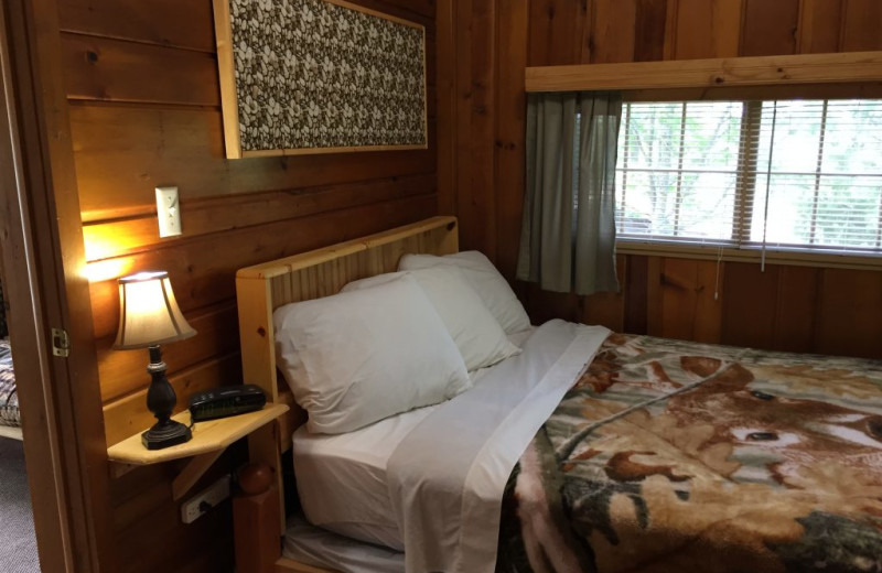 Cabin bedroom at Blackduck Lodge & Resort.