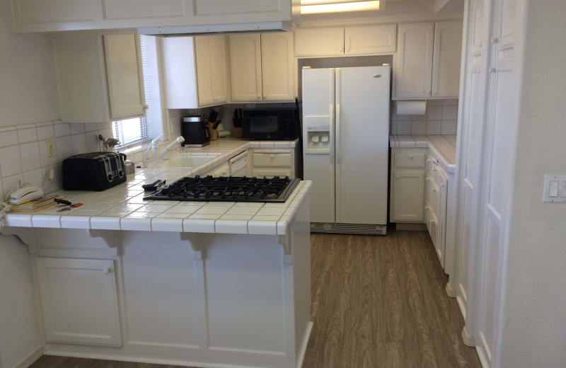 Rental kitchen at Pismo Beach Vacation Rentals.