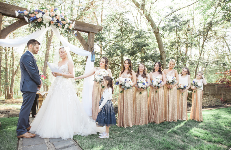 Wedding ceremony at Arrow Park Lake and Lodge.