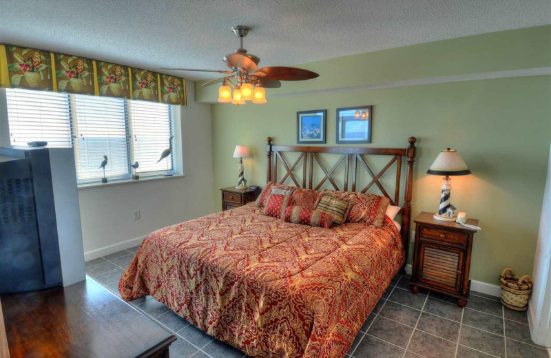 Rental bedroom at CondoLux Vacation Rentals.