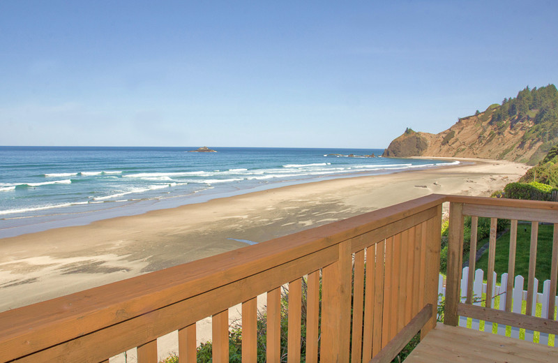 Vacation rental deck view at Beachfront Vacation Rentals.