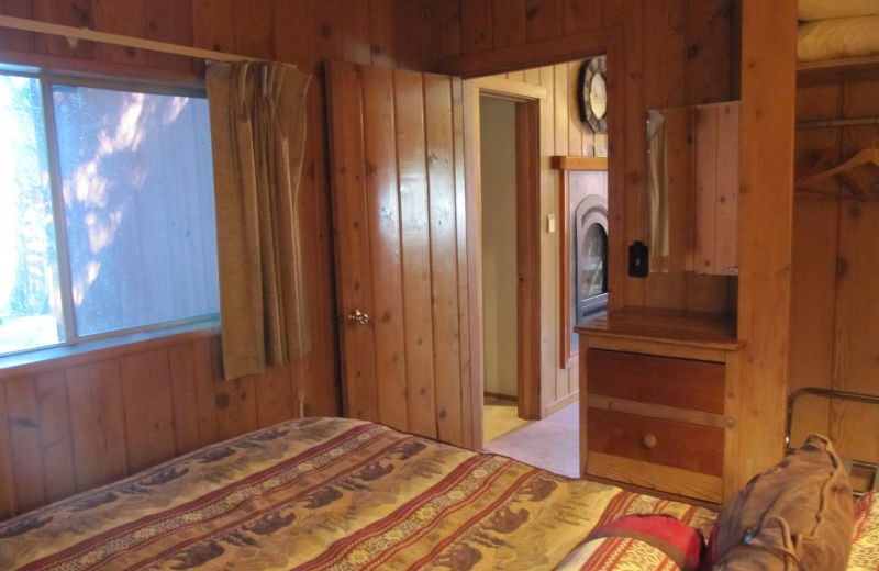 Cabin bedroom at Rain Forest Resort Village.