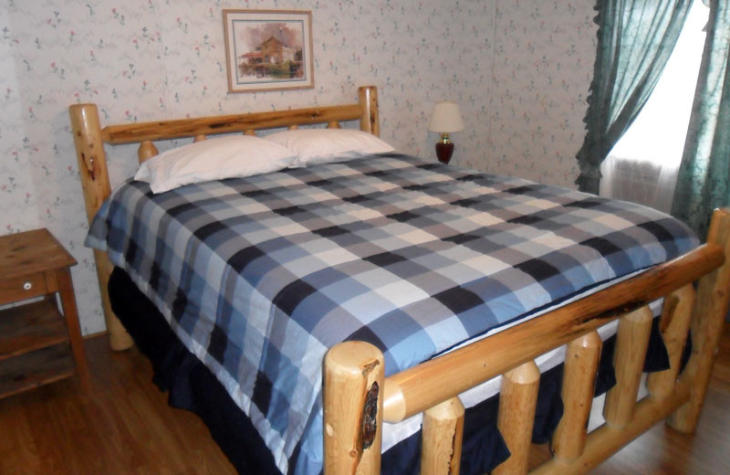 Cottage bedroom at King Creek Resort & Marina.