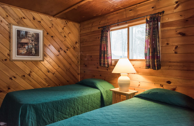 Cabin bedroom at Pitlik's Sand Beach Resort.