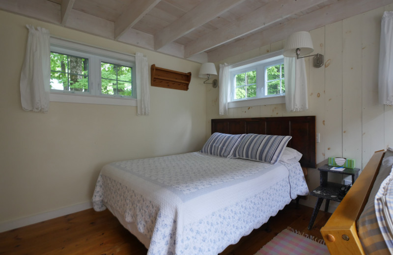 Cottage bedroom at Sunapee Harbor Cottages.