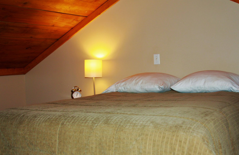 Cabin bedroom at Sleepy Bear Cabins.