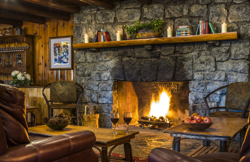 The Lobby at Garnet Hill Lodge with it's warm and inviting fireplace is a great place for guests to relax and meet new friends.