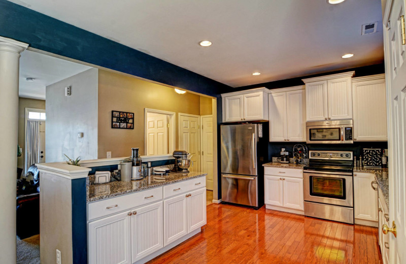 Vacation rental kitchen at Century 21 Action Inc.