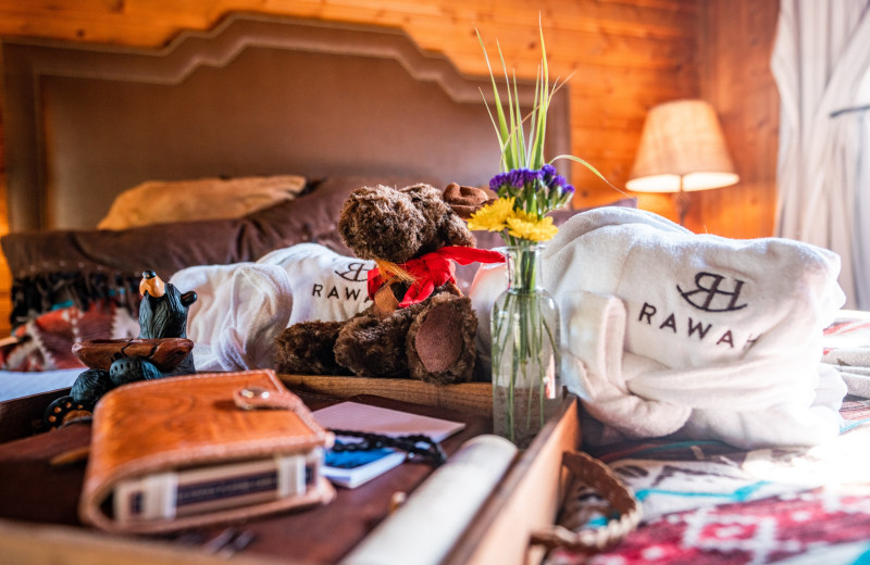 Cabin bedroom at Rawah Guest Ranch.