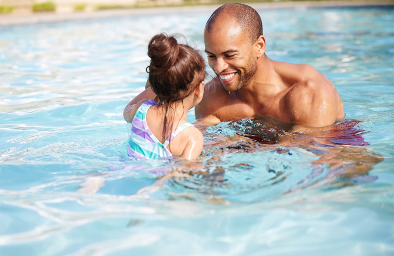 Family in pool at The Inn at the Cove.