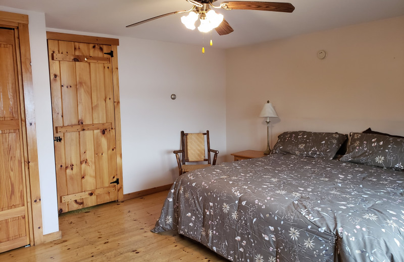 Cabin bedroom at The Birches Resort.