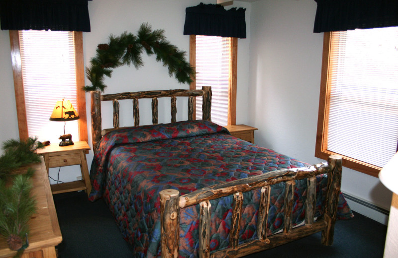 Chalet bedroom at Timber Creek Chalets.