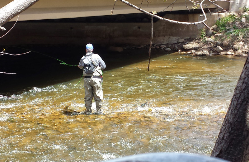 Fishing at Rustic River Cabins.