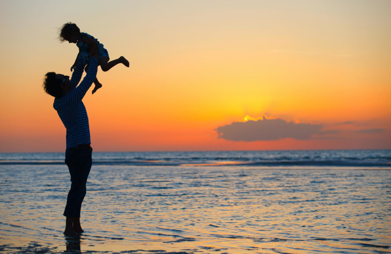 Family on the beach at Myrtle Beach Vacation Rentals.