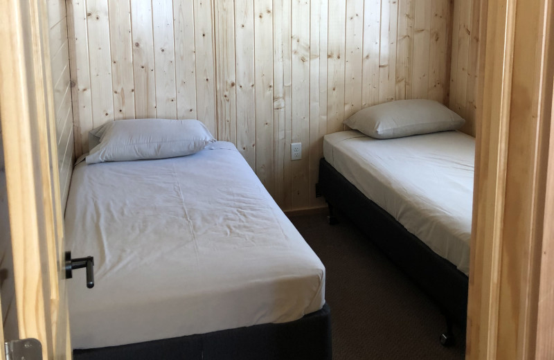 Cabin bedroom at Vacationland Resort.