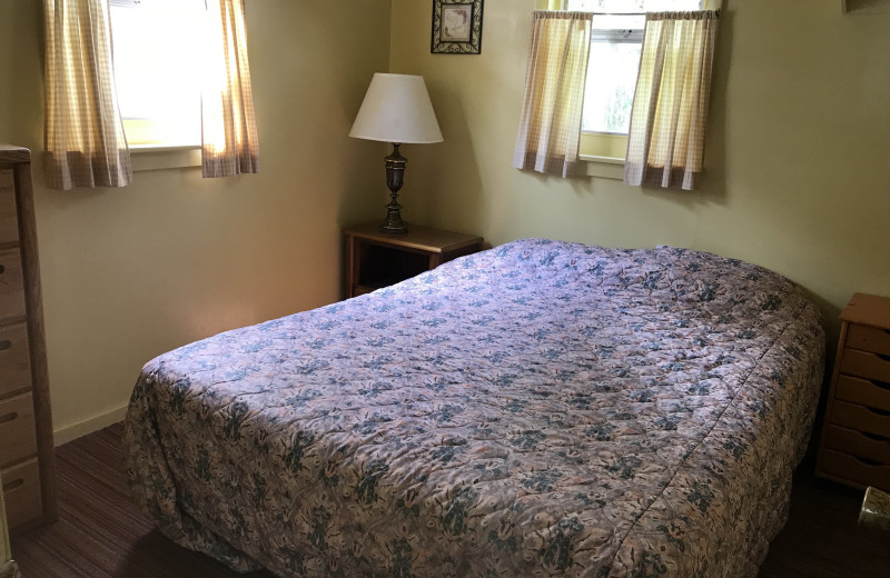 Cabin bedroom at Driftwood Resort.