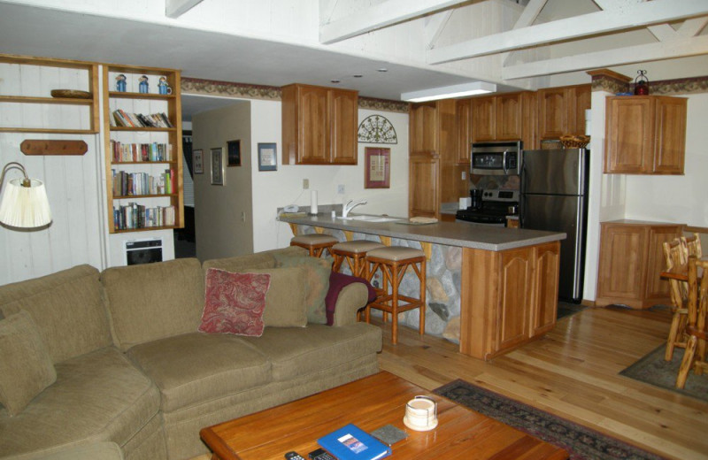 Vacation rental living room and kitchen at Seasons 4 Condominium Rentals.