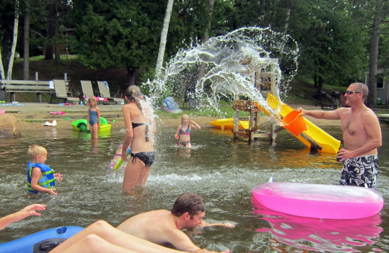 Splashing at the beach at Hyde-A-Way Bay Resort.