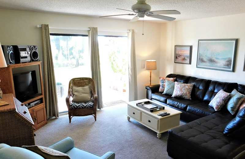 Rental living room at Family Sun Vacation Rentals.