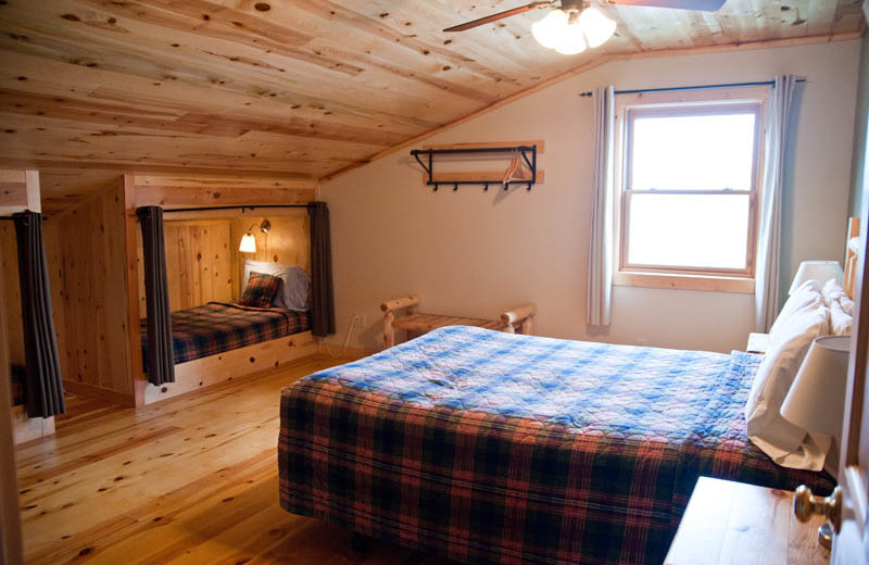 Cabin bedroom at Campfire Bay Resort.