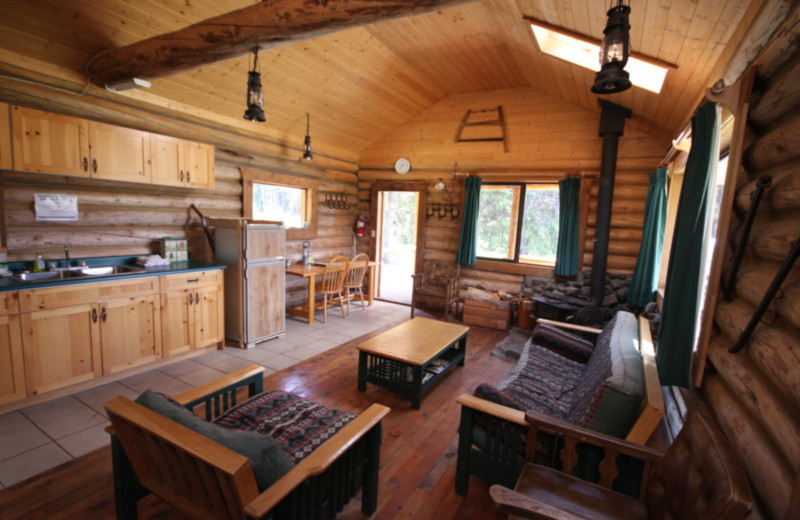 Cabin living room at Chaunigan Lake Lodge.