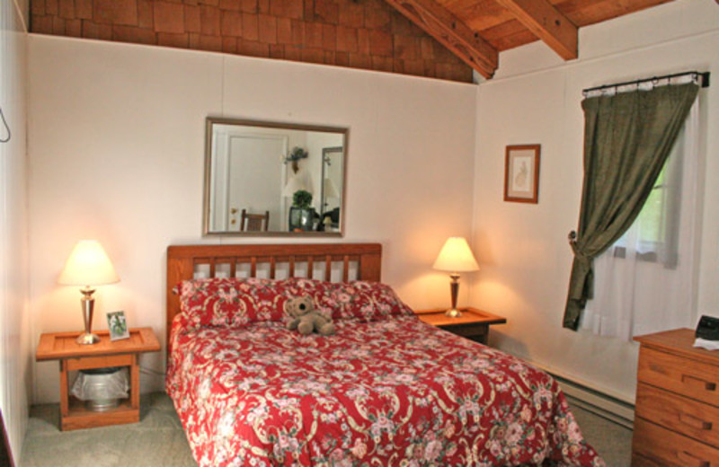 Vacation rental bedroom at Snowshoe Properties Management.