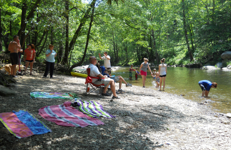 Swimming in the river at Yogi Bear's Jellystone Resort Cherokee.