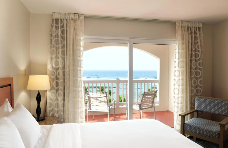 Guest room at Embassy Suites Dorado del Mar.