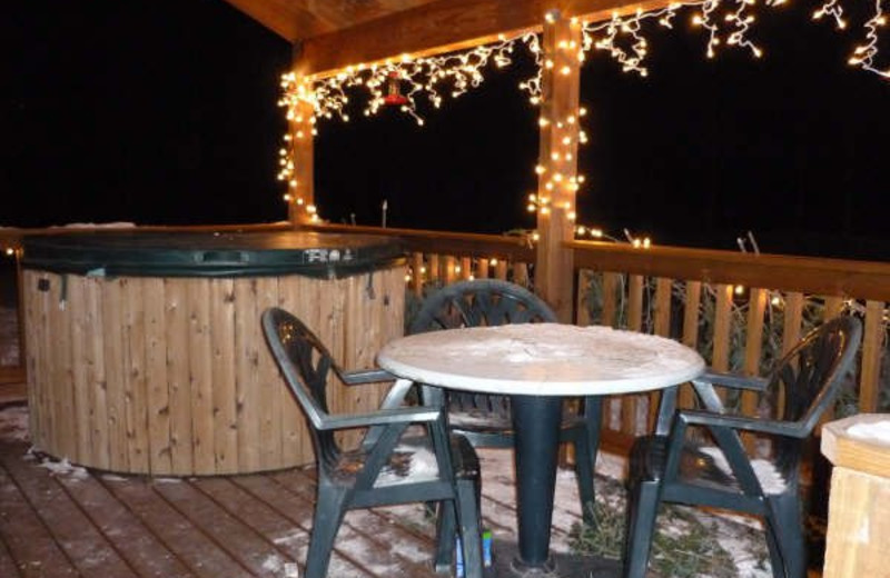 Cabin deck at Spot in the Woods Lodging.