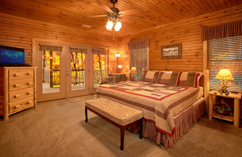 Cabin bedroom at Timber Tops Luxury Cabin Rentals.